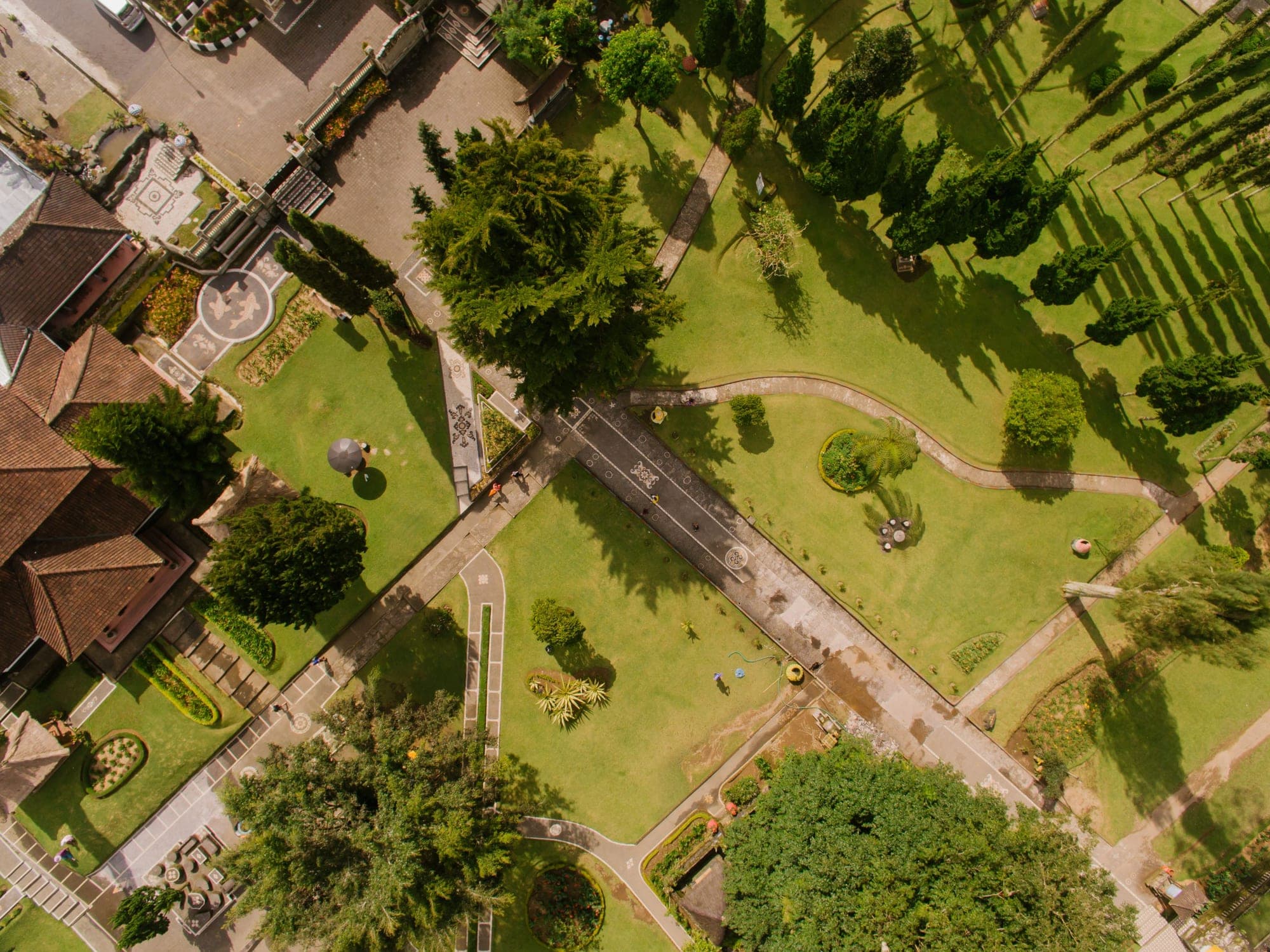 A neat, well-kept garden with a tidy lawn and clear borders